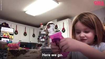 dad hysterically dances as the daughter does art and craft for virtual school