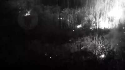 ruzzians tried to hide some ammo in the forest but something went wrong. Belgorod. Filmed by drone with thermal camera