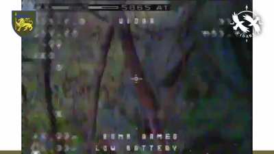 Drone footage by the 60th Mechanized Brigade shows Russian troops wrapped in yellow tape trying to infiltrate Ukrainian positions during the truce declared by Putin.