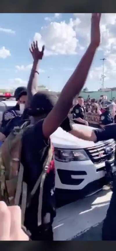 Cop pulls off protester’s mask , pepper sprays him