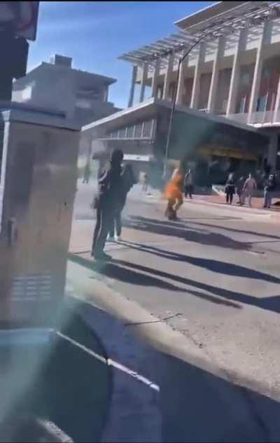 Bystanders try to help man thats on fire