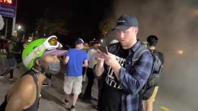 Woman gets mad armed man won’t let her loot store