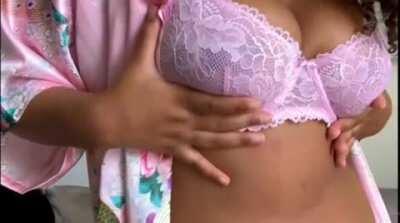 Corie grabbing her titties