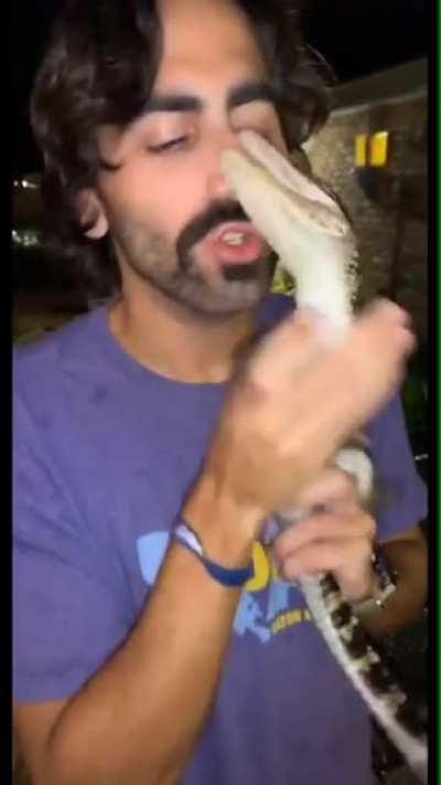 Guys nose shredded by baby gator