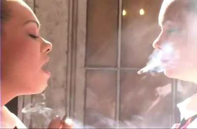 maddie and nadia sharing smoke outside
