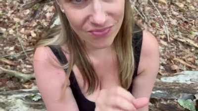 Blonde MILF swallows cum in forest