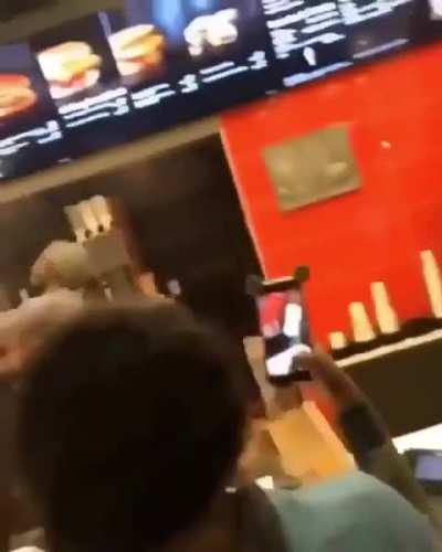 Dude ends up behind the counter and gets served up