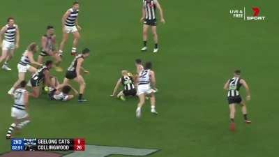 Gary Ablett selling some candy to a Magpie
