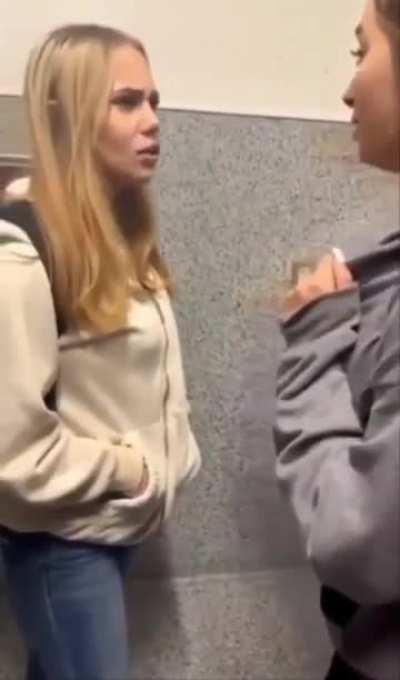 Girl gets knocked out by another student