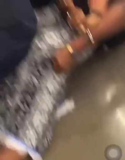 Cop decks crazy woman for trying to bite him!