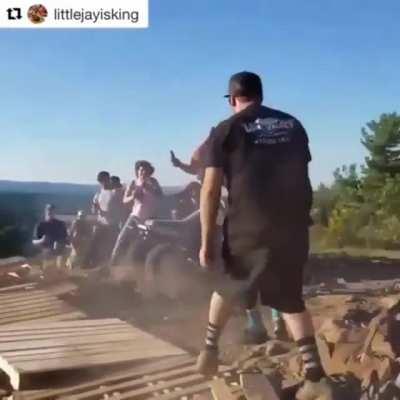Sending your ATV off of a cliff while your friends are watching