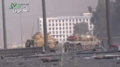 Syrian Army BMP-2s moving in column take no chances, suppressing at random while moving through Qaboun on the Damascus-Homs highway - 6/24/2013