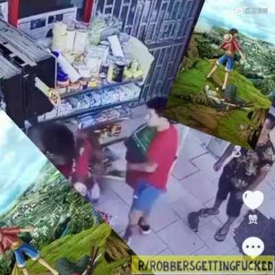 Chinese store owner isn't to pleased with thief stealing his precious goods.