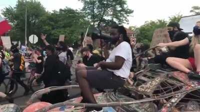 A Protest in Detroit blasting a Dirtybird track with a new chant. Original track is 