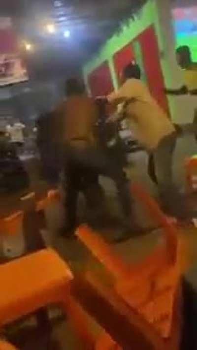 Guys fight after soccer goal