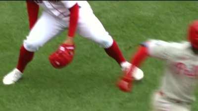 Adam Ottavino goes between the legs and then sails the throw to first.