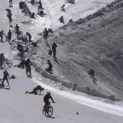 Riding hundreds of bicycles on a ski slope