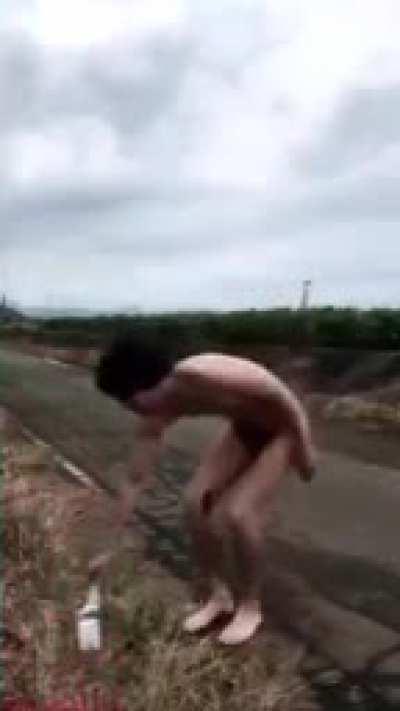 naked korean guy squirting milk out of his asshole while doing a catwalk and jumping.