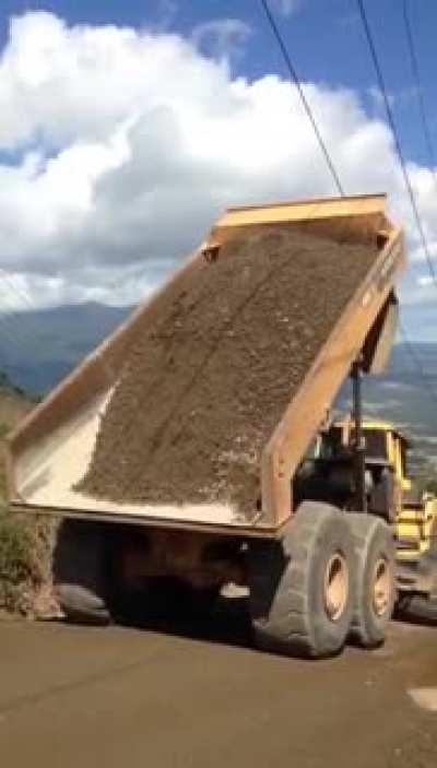 This is why you need a spotter when working around power lines.