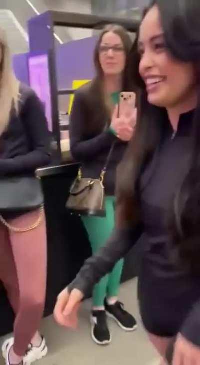 Rae getting filmed walking away