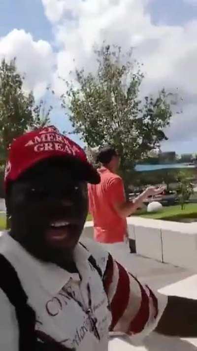 Black man melting White snowflakes.