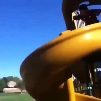 Biking down a slide