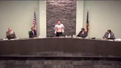 Lee Wong, an elected official in West Chester, Ohio & US Army veteran with 20-years of service, took his shirt off during a town hall meeting on Wednesday and revealed scars he received during his service. “Is this patriot enough?” he asked