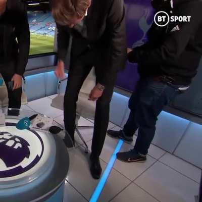 Peter Crouch sees the funny side of a tight squeeze in the media room at Elland Road