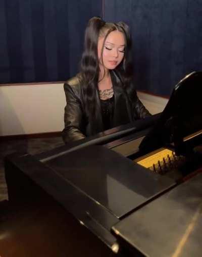 Bella playing piano