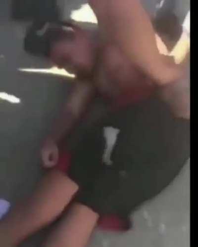 Guy Savagely Body Slams a a guy into a Seizure then proceeds to Beat The Brakes Off the Seized up guy's best friend