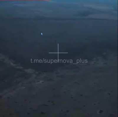 Russian soldier hits Ukraine VPN drone with a stick and a drone explodes