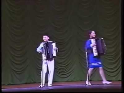 3 North Korean kids playing 3 Excelsior ACs