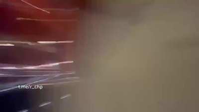 Speeding on a busy road.