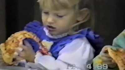 Try to take a bite of the pizza