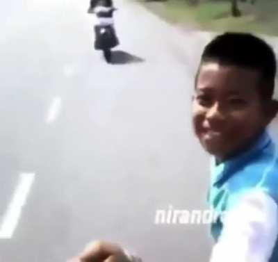 WCGW walking towards a moving bike