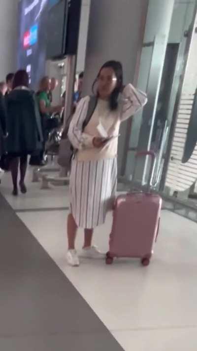 Girl staring at my bulge in grey pants