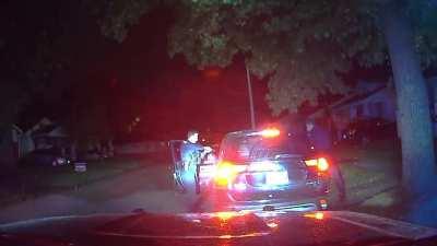 police officer dodges headshot then proceeds to shoot civilian