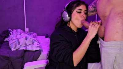 Gamer girl fills her mouth with milk