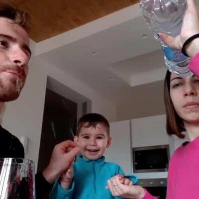This sweet boy in Italy believes by holding his parents’ hands he can make the water travel from one person to the other