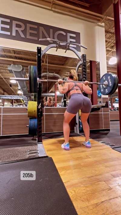 Mandy Rose lifting 205 pounds