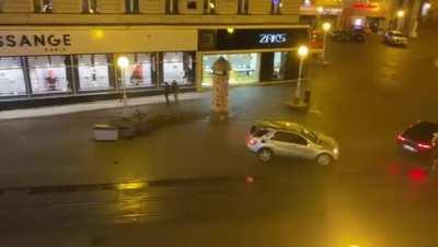 Filming a car chase scene. Tram flips a car.