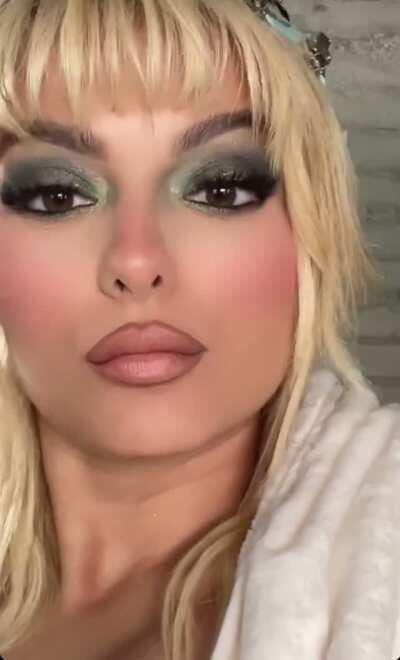 sexy while getting her makeup done