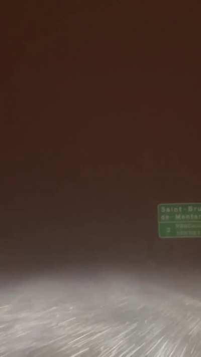 Getting home from work in the blizzard. This was on the highway.