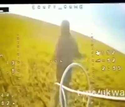 A Russian orc lobs his rifle at a Ukrainian FPV drone and instantly regrets it