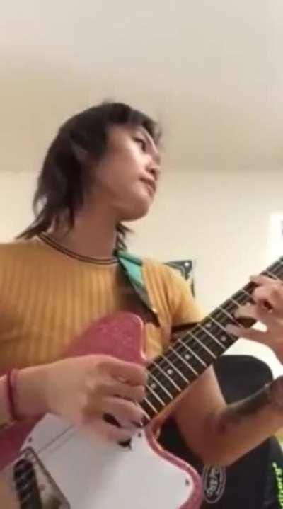 The play style of this guitarist is so unique, yet so beautiful.