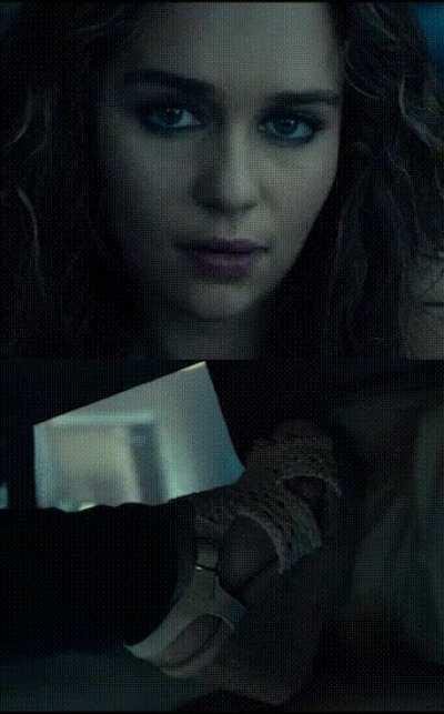 Sassy Emilia Clarke teasing you under the table with her heels. How do you react?