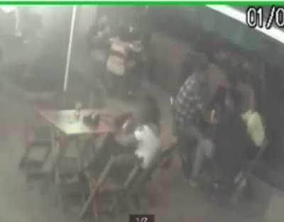 WCGW if A man hits a woman at the bar and takes change from 4 men who were at the next table.