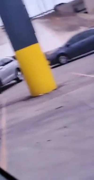 Waiting in line behind parked cars