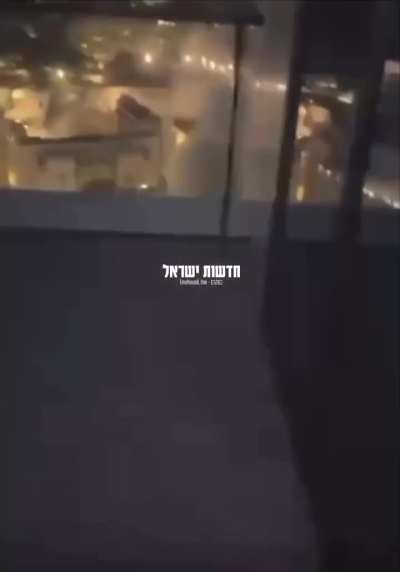 First person view of a very close call a missile strike from a high rise apartment