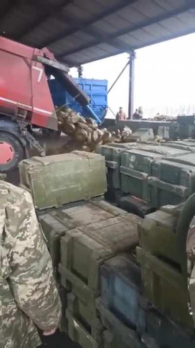 Unloading a truck full of land mines in Ukraine